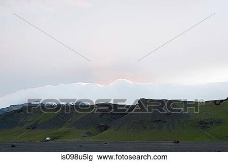 Iceland, sunset over volcanic mountains View Large Photo Image Stock Image - Iceland, sunset over volcanic mountains. Fotosearch