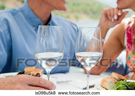 Senior couple having lunch on a boat holiday View Large Photo Image Stock Photo - Senior couple having lunch on a boat holiday. Fotosearch