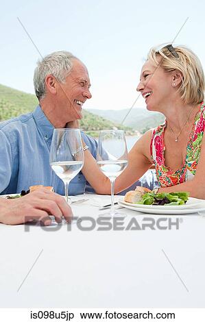 Senior couple having lunch on a boat holiday View Large Photo Image Stock Photography - Senior couple having lunch on a boat holiday. Fotosearch