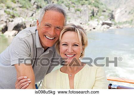 Senior couple on holiday on boat View Large Photo Image Stock Image - Senior couple on holiday on boat. Fotosearch