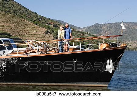 Senior couple on holiday on boat View Large Photo Image Stock Photo - Senior couple on holiday on boat. Fotosearch