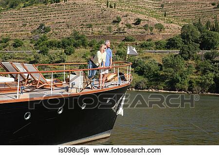 Senior couple on holiday on boat View Large Photo Image Stock Photograph - Senior couple on holiday on boat. Fotosearch