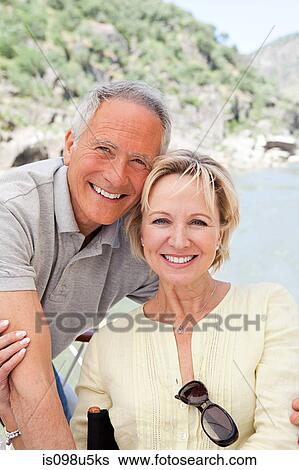 Senior couple on holiday on boat View Large Photo Image Stock Photograph - Senior couple on holiday on boat. Fotosearch