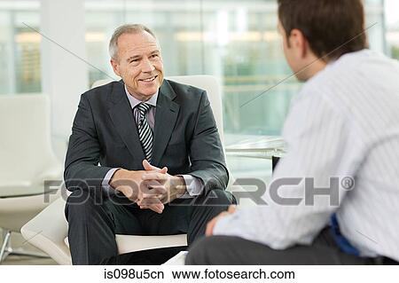 Businessmen shaking hands View Large Photo Image Picture - Businessmen shaking hands. Fotosearch