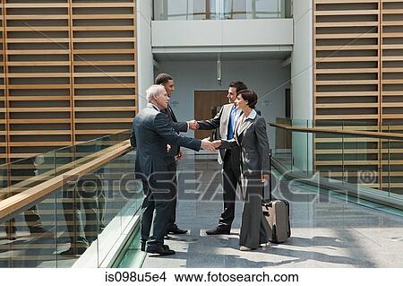 Businesspeople shaking hands View Large Photo Image Picture - Businesspeople shaking hands. Fotosearch