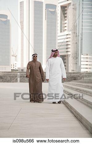 Businessmen in dubai View Large Photo Image Stock Photograph - Businessmen in dubai. Fotosearch
