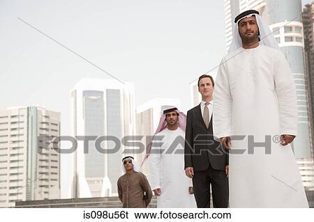 Middle eastern and western businessmen in dubai View Large Photo Image Stock Photograph - Middle eastern and western businessmen in dubai. Fotosearch