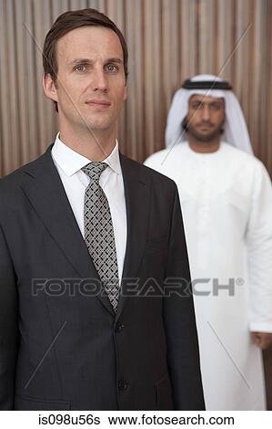Western and middle eastern busnessmen View Large Photo Image Stock Photograph - Western and middle eastern busnessmen. Fotosearch