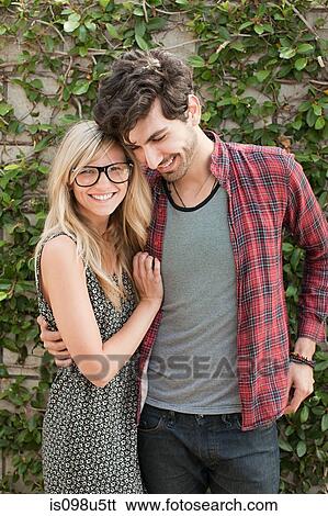 Affectionate young couple on vacation View Large Photo Image Stock Photograph - Affectionate young couple on vacation. Fotosearch