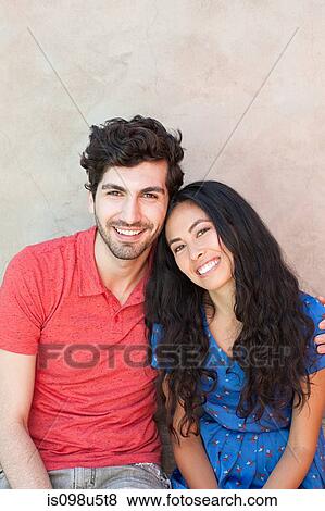 Stock Photo - Portrait of young couple. Fotosearch