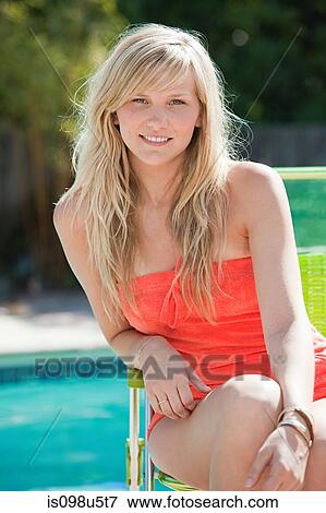Portrait of young woman with blond hair View Large Photo Image Stock Photo - Portrait of young woman with blond hair. Fotosearch