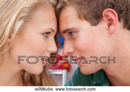 Teenage couple face to face View Large Photo Image Stock Photo - Teenage couple face to face. Fotosearch