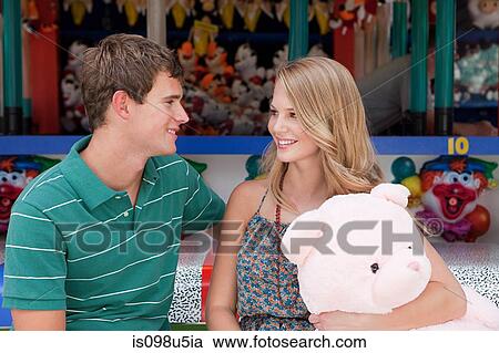 Teenage couple with teddy bear View Large Photo Image Stock Image - Teenage couple with teddy bear. Fotosearch