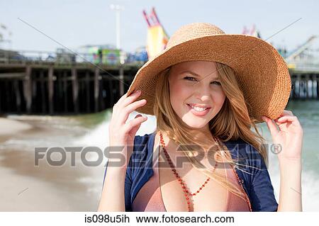Teenage girl in sun hat View Large Photo Image Stock Image - Teenage girl in sun hat. Fotosearch