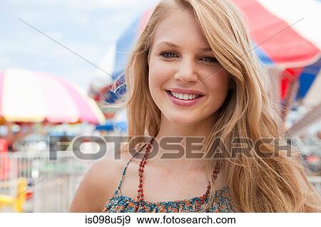 Stock Photo - Teenage girl smiling. Fotosearch