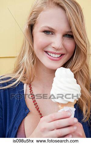 Teenage girl with ice cream cone View Large Photo Image Stock Photo - Teenage girl with ice cream cone. Fotosearch