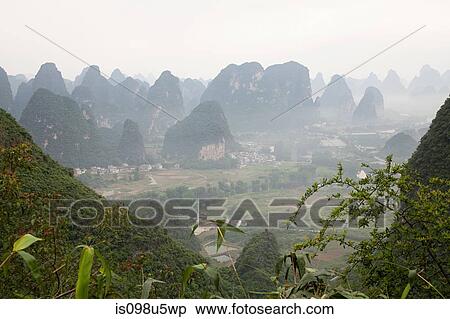 China, guangxi province, yangshuo, moon hill View Large Photo Image Stock Photography - China, guangxi province, yangshuo, moon hill. Fotosearch
