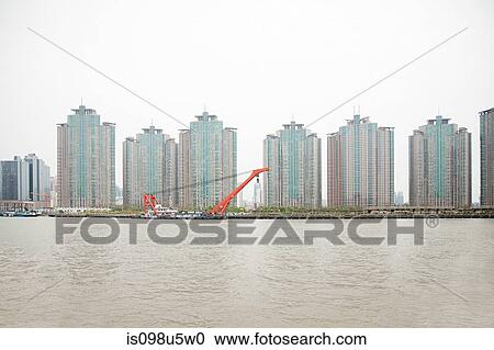 China, shanghai, apartment blocks and river View Large Photo Image Stock Image - China, shanghai, apartment blocks and river. Fotosearch