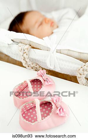 Baby girl shoes and baby sleeping View Large Photo Image Stock Image - Baby girl shoes and baby sleeping. Fotosearch