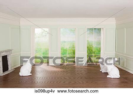 Rabbits in a tiny room View Large Photo Image Stock Photo - Rabbits in a tiny room. Fotosearch
