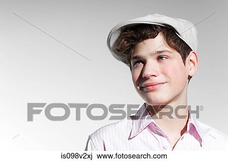 Boy wearing a flat cap View Large Photo Image Stock Image - Boy wearing a flat cap. Fotosearch