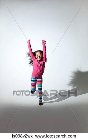 Girl jumping View Large Photo Image Stock Photo - Girl jumping. Fotosearch