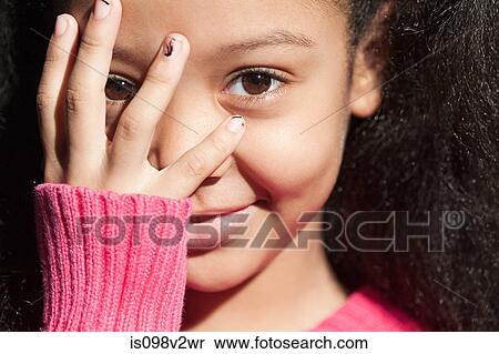 Girl putting her hand on her face View Large Photo Image Stock Photography - Girl putting her hand on her face. Fotosearch