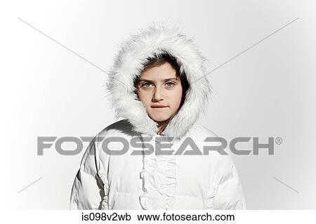 Girl wearing a white coat with fur hood View Large Photo Image Stock Image - Girl wearing a white coat with fur hood. Fotosearch