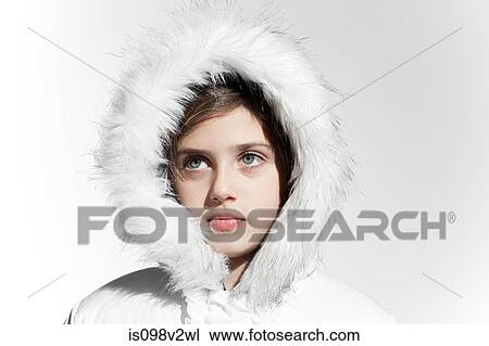 Girl wearing a white coat with fur hood View Large Photo Image Stock Image - Girl wearing a white coat with fur hood. Fotosearch