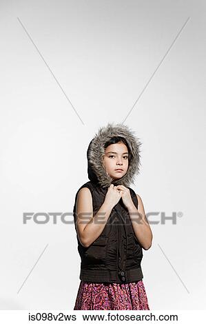 Girl wearing fur hood View Large Photo Image Stock Photograph - Girl wearing fur hood. Fotosearch