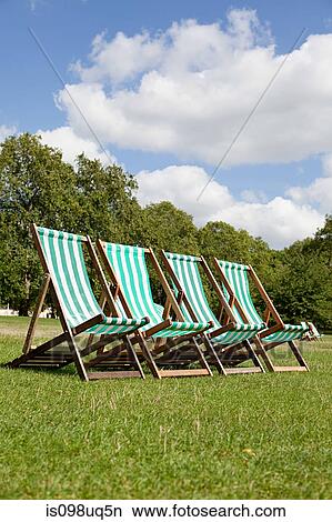 Deck chairs in St James's Park, London View Large Photo Image Picture - Deck chairs in St James's Park, London. Fotosearch