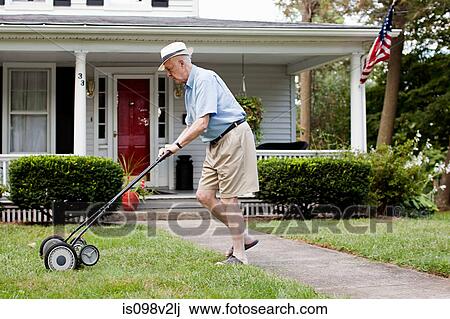 Senior man mowing his front lawn View Large Photo Image Stock Image - Senior man mowing his front lawn. Fotosearch