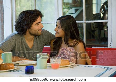 Stock Image - Couple having breakfast. Fotosearch