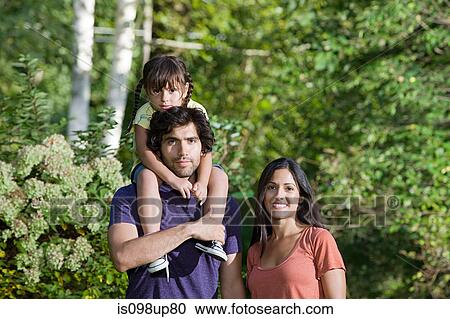 Family together in woods View Large Photo Image Stock Image - Family together in woods. Fotosearch