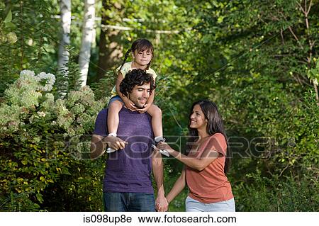 Family together in woods View Large Photo Image Stock Image - Family together in woods. Fotosearch