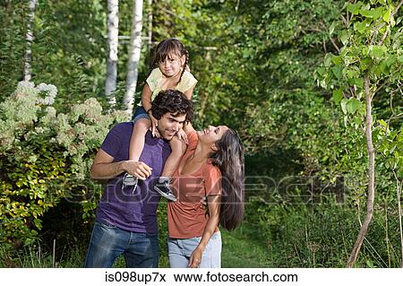 Family together in woods View Large Photo Image Stock Photo - Family together in woods. Fotosearch
