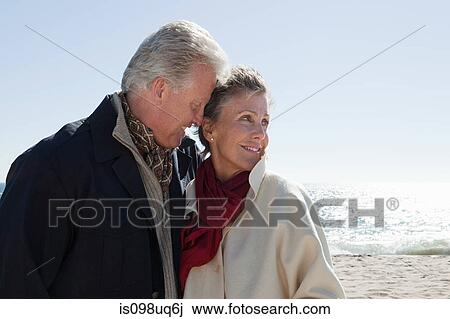 Mature couple at the coast View Large Photo Image Stock Image - Mature couple at the coast. Fotosearch