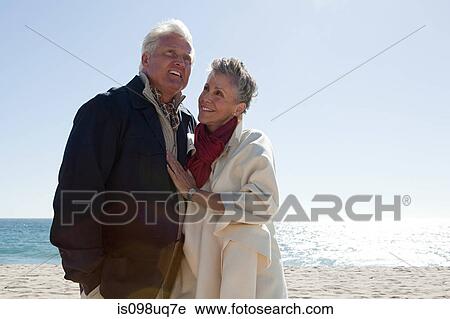 Mature couple by the sea View Large Photo Image Stock Image - Mature couple by the sea. Fotosearch