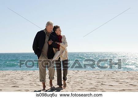 Mature couple by the sea View Large Photo Image Stock Photograph - Mature couple by the sea. Fotosearch