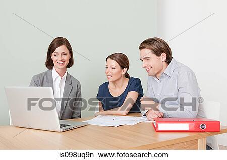 Young couple with financial adviser View Large Photo Image Picture - Young couple with financial adviser. Fotosearch