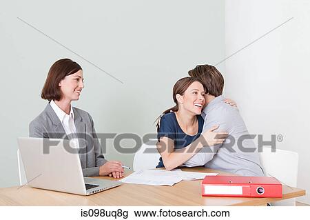 Young couple with financial adviser View Large Photo Image Stock Image - Young couple with financial adviser. Fotosearch