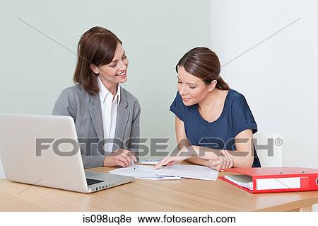 Young woman with financial adviser View Large Photo Image Stock Image - Young woman with financial adviser. Fotosearch