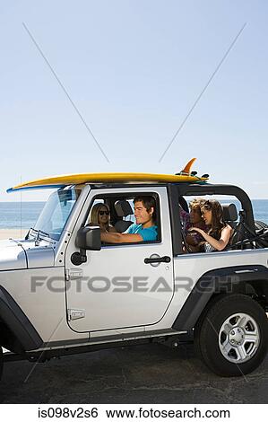 Friends in SUV View Large Photo Image Stock Photograph - Friends in SUV. Fotosearch