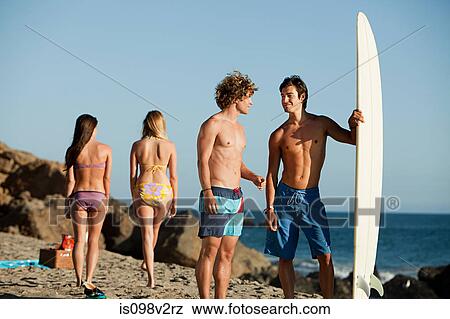 Young people on the beach View Large Photo Image Stock Photo - Young people on the beach. Fotosearch