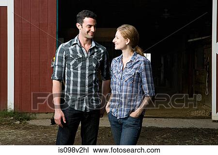 Couple at stable View Large Photo Image Stock Image - Couple at stable. Fotosearch