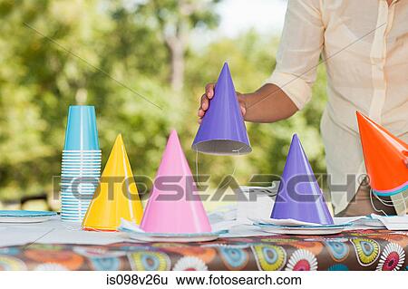 Mother preparing for birthday party View Large Photo Image Stock Photograph - Mother preparing for birthday party. Fotosearch