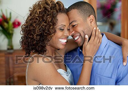 Stock Photo - Affectionate young couple. Fotosearch