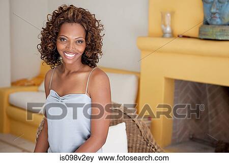 Portrait of a young woman View Large Photo Image Stock Photo - Portrait of a young woman. Fotosearch