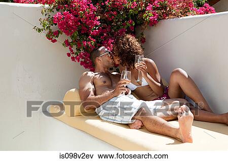Stock Photo - Relaxed couple kissing. Fotosearch