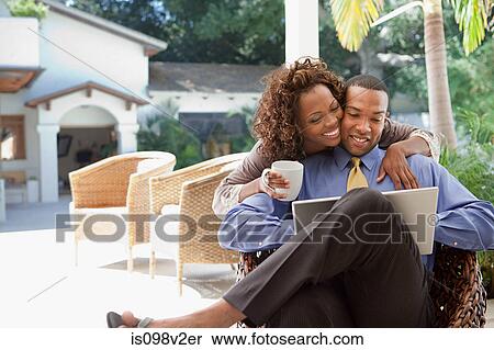 Young couple with laptop View Large Photo Image Stock Photography - Young couple with laptop. Fotosearch